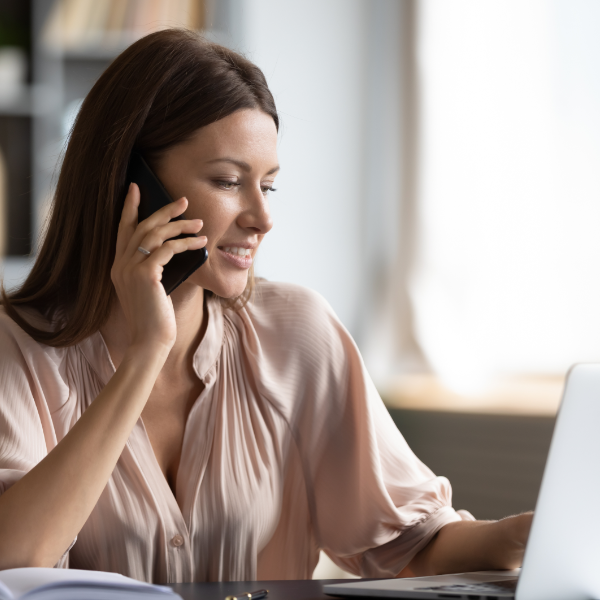 Woman On Phone And Laptop 600X600